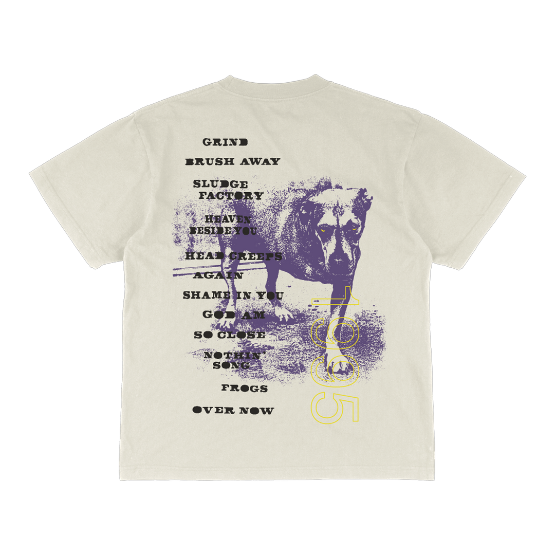 Cream-colored cotton t-shirt featuring a distressed purple graphic of a dog with black and yellow text overlay.