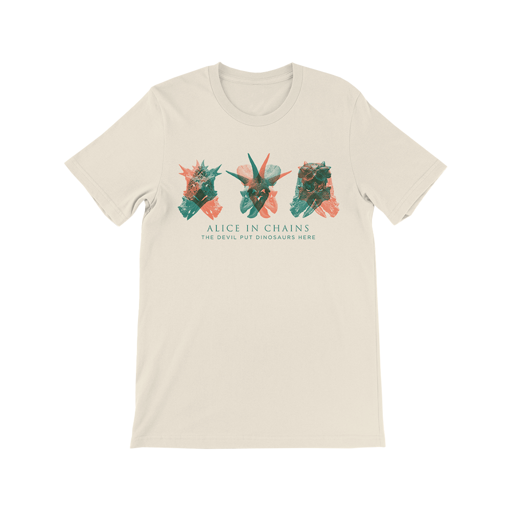 Beige t-shirt with dinosaur graphics and ’Alice in Chains’ text.